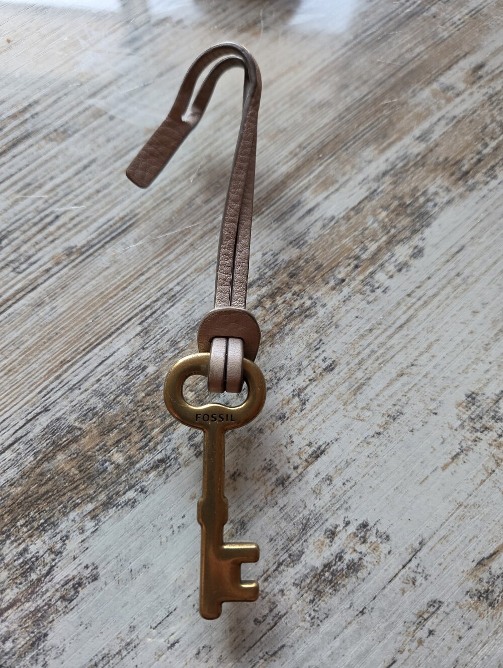 Fossil Brass Key on Cream Leather